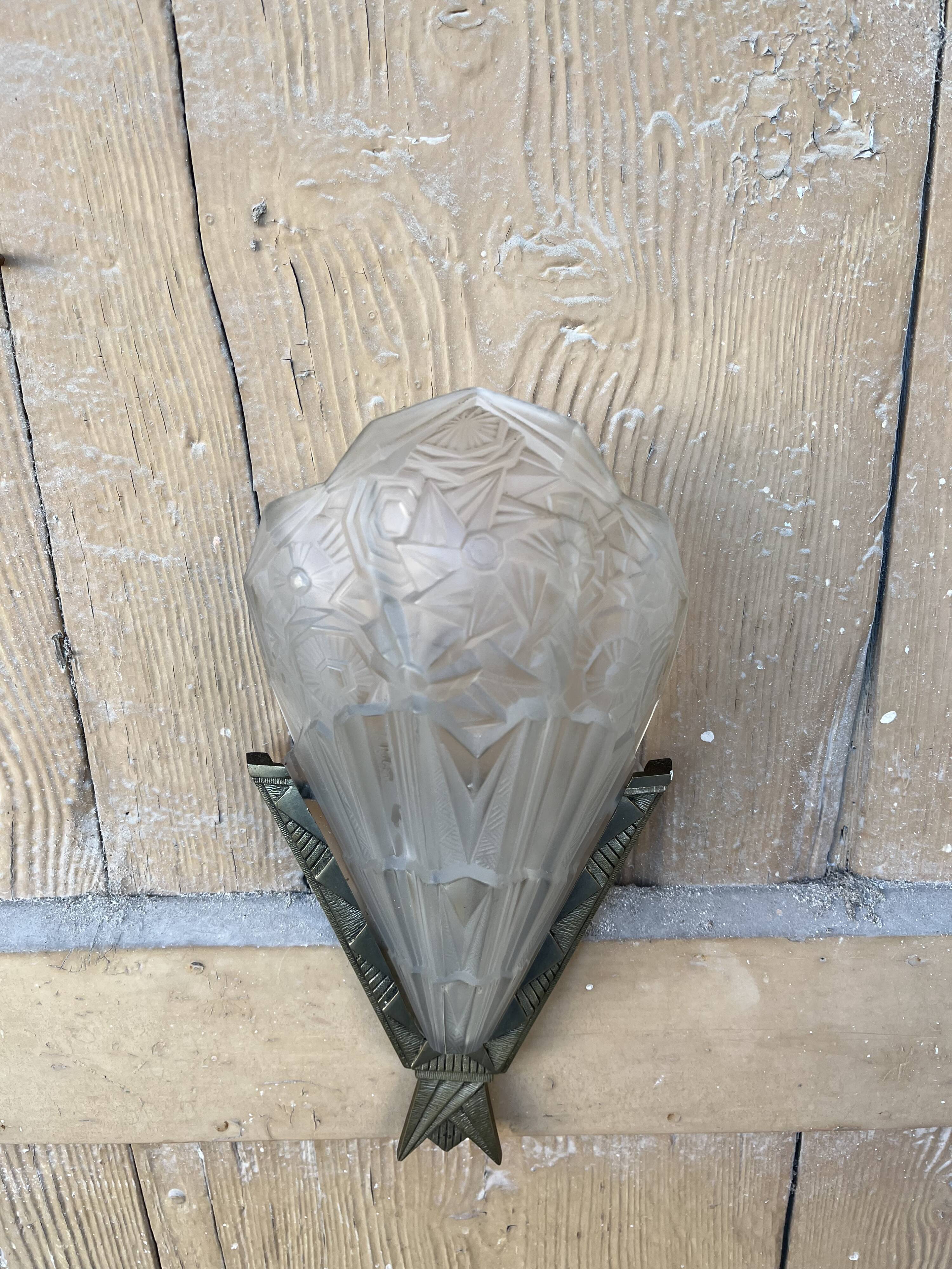 Signed art deco wall light