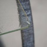 Decorative shelf unit, round metal frames with curved legs and glass shelves, 1960.