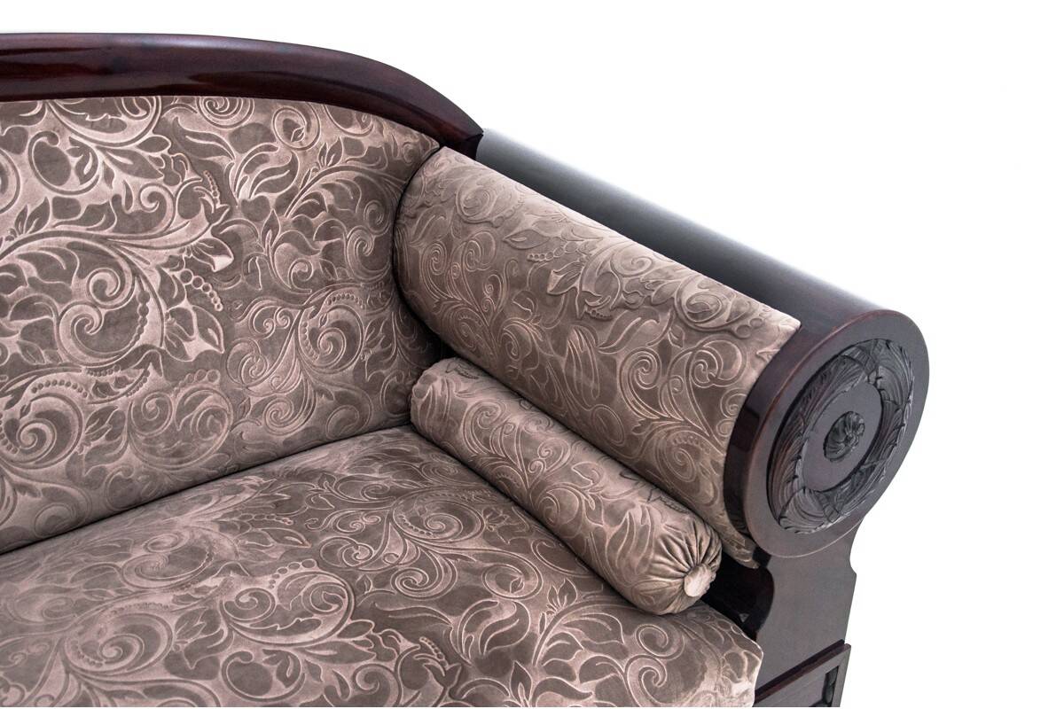 Antique sofa in Biedermeier style, Northern Europe, circa 1840.