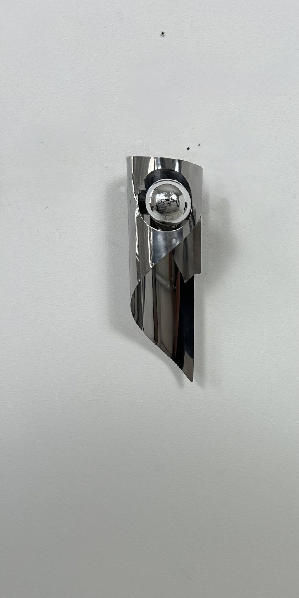 Pair of vintage wall lights, chrome metal, France, 1970.