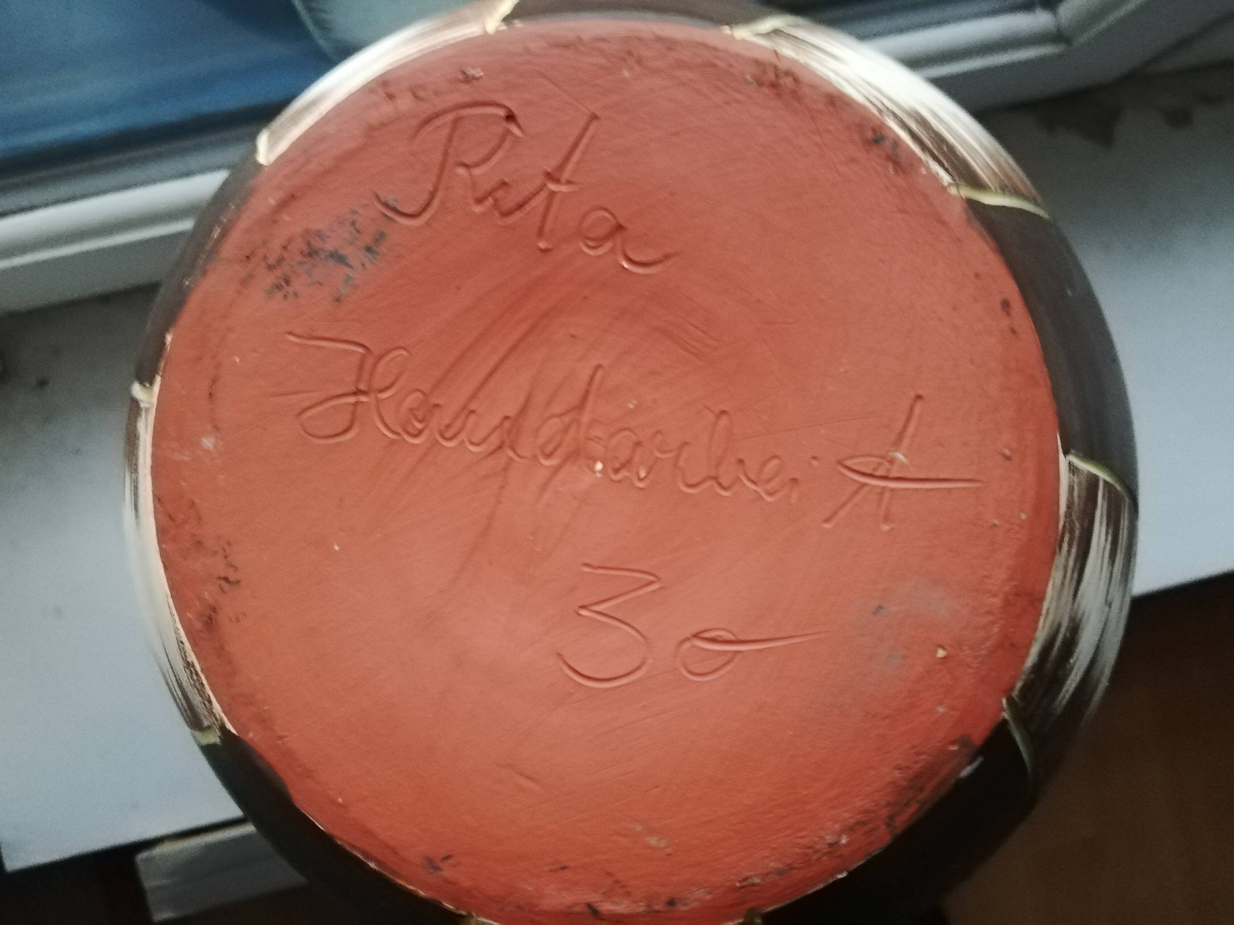 Ceramic pitcher signed