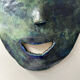 Masque brutaliste signé