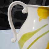 Pitcher with yellow flowers