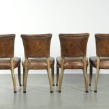 Set of 4 vintage cowhide and wooden dining chairs
