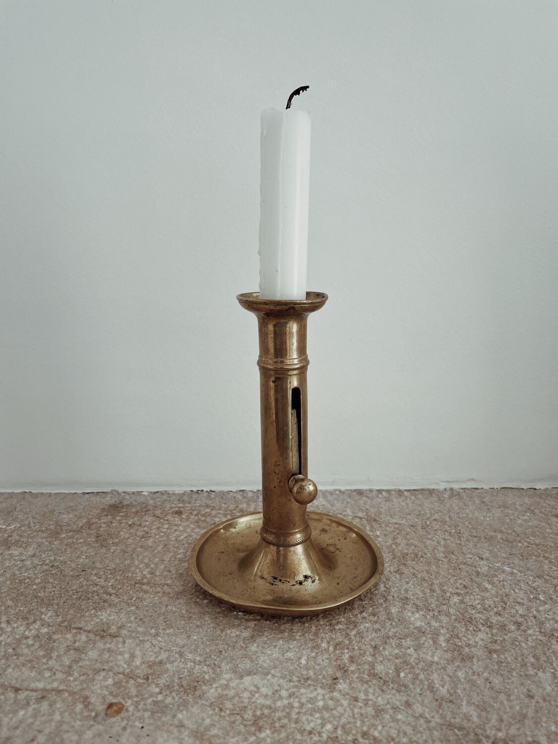 Antique brass candle holder