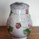 Barbotine pitcher with pastel flower decoration