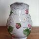Barbotine pitcher with pastel flower decoration