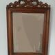 Wooden hanging mirror with vintage carved knot