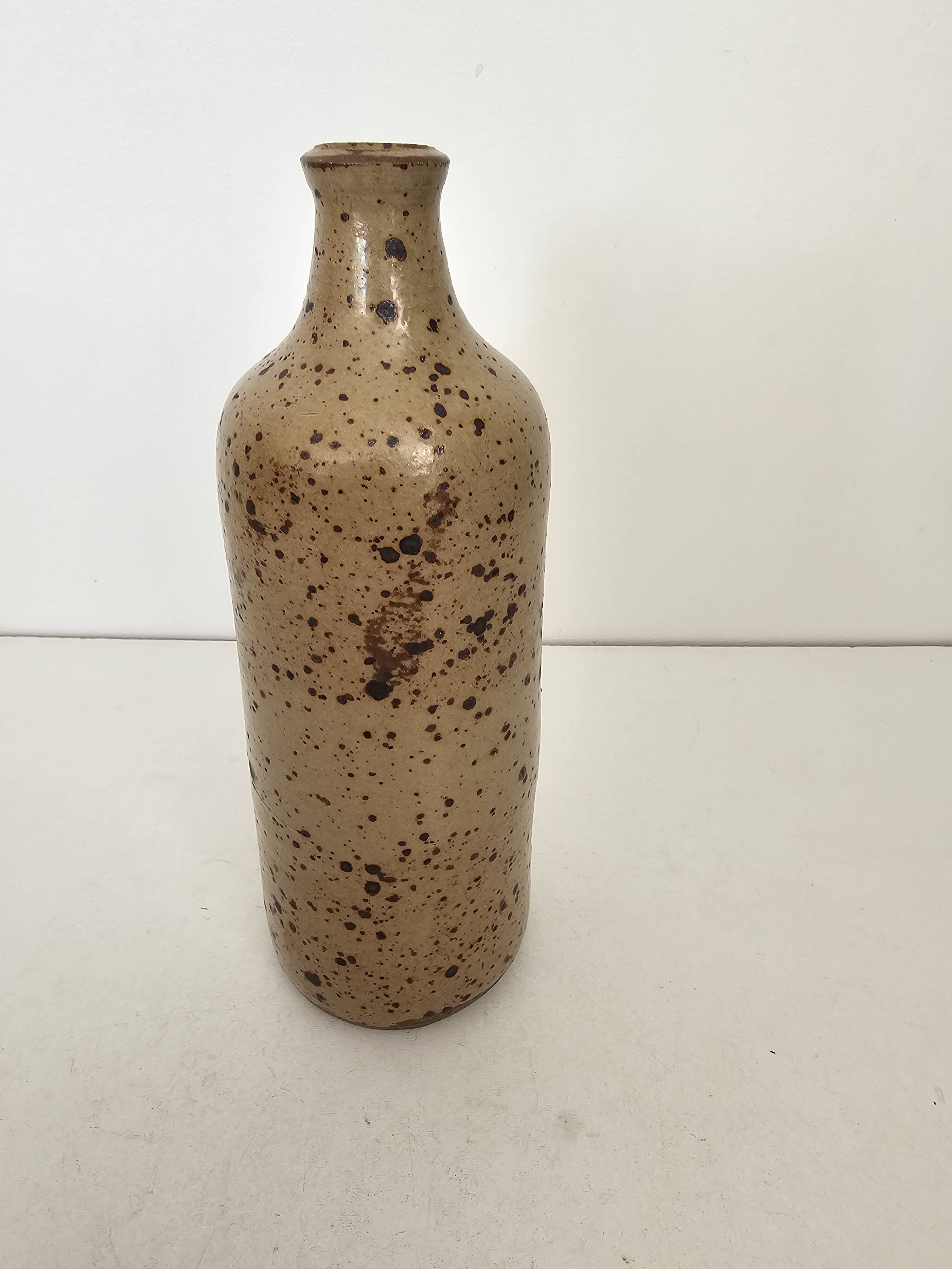 Pyrite stoneware single-flower vase in the shape of a bottle signed Aular?