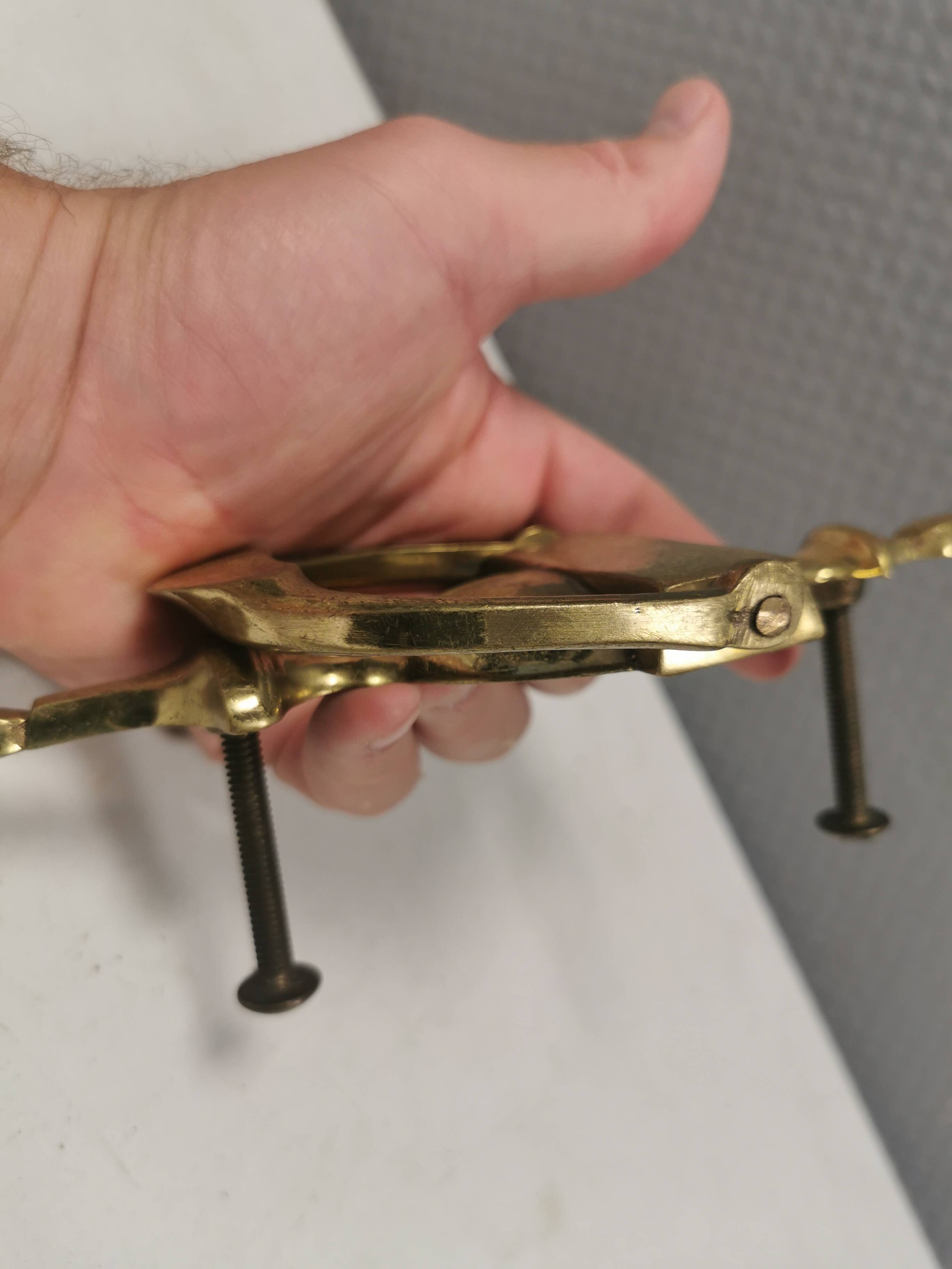 Old door hammer in solid brass. Estimated 1960s.