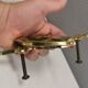 Old door hammer in solid brass. Estimated 1960s.