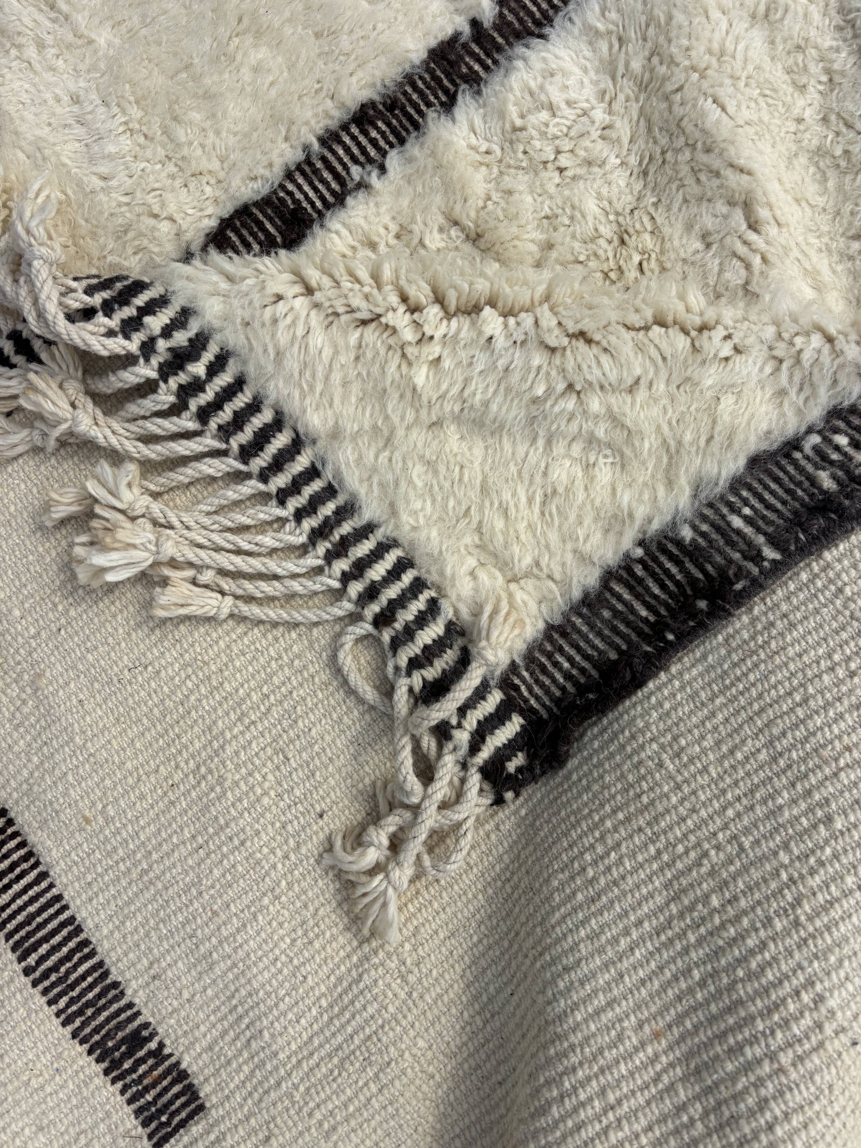 Large Berber M'rirt rug in cream and black wool, Moroccan rug.