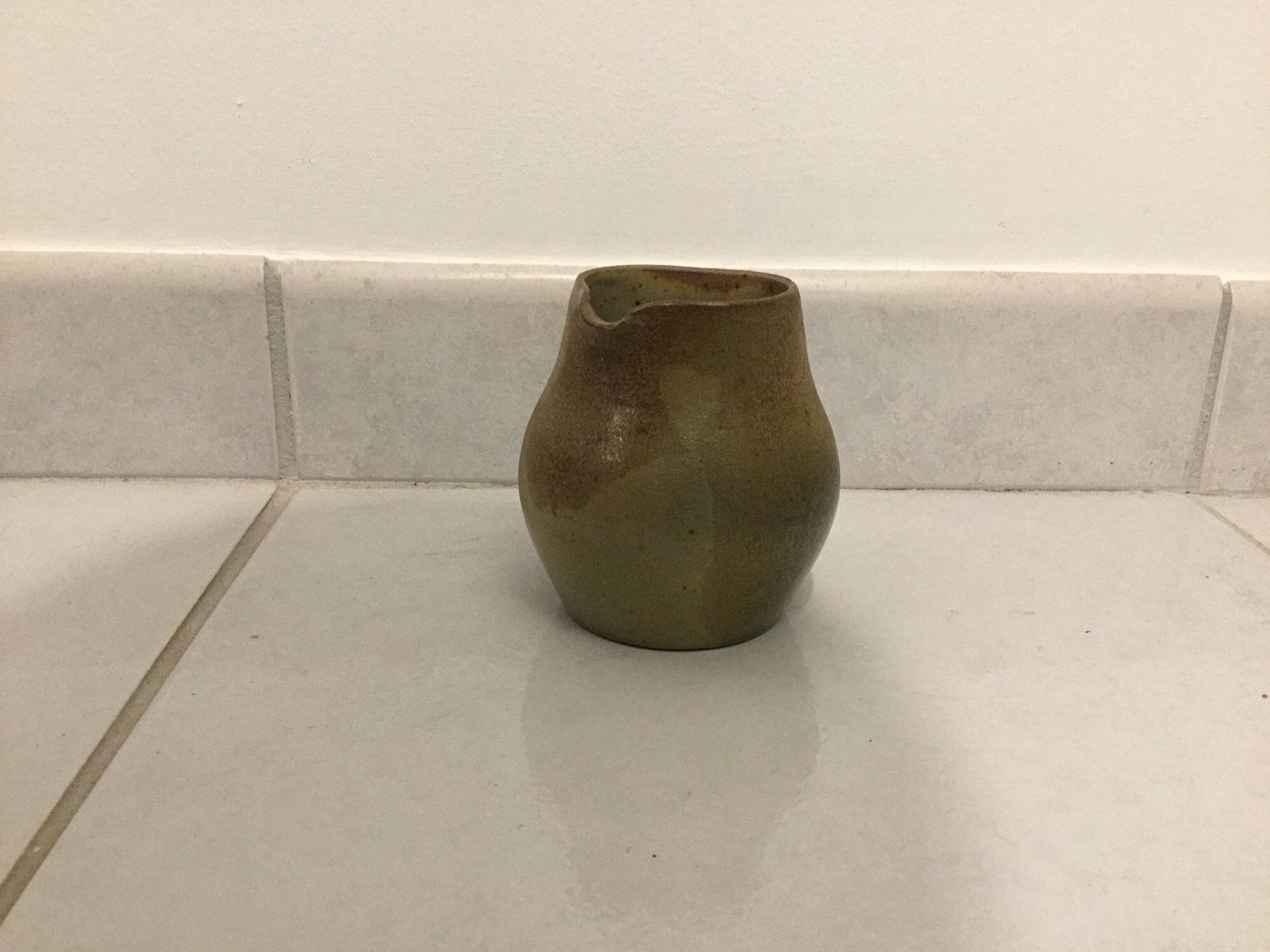Sandstone milk pot