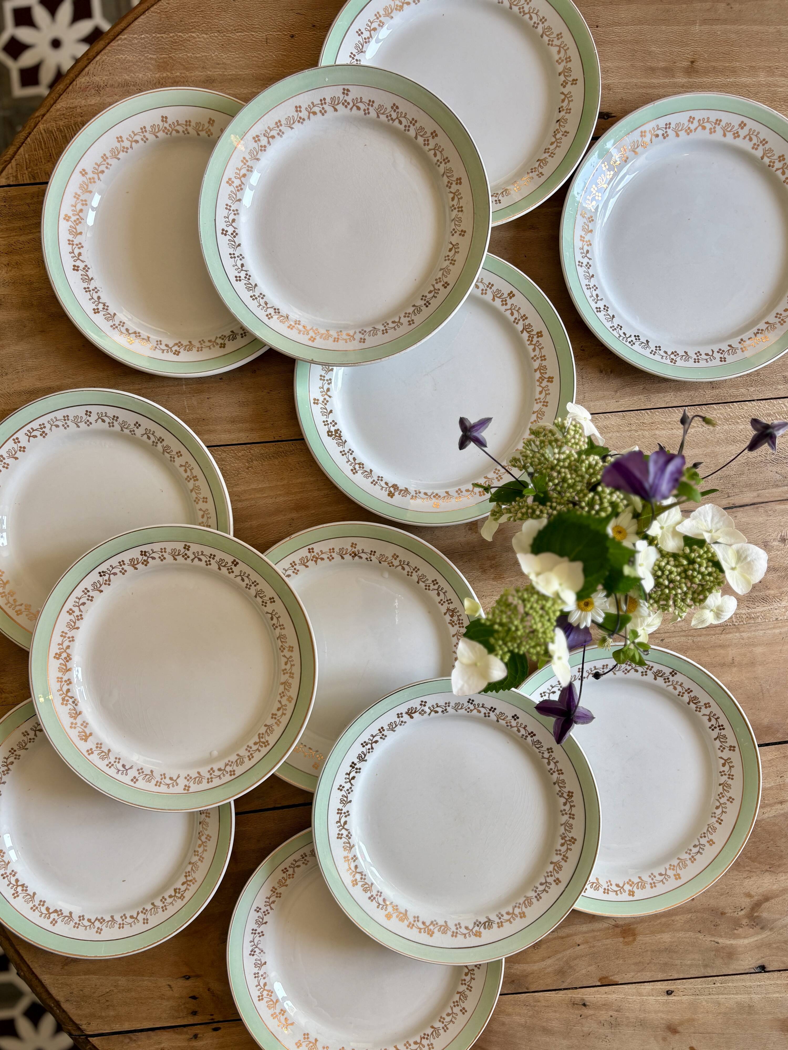 Set of 12 white, mint and gold flat plates, Mosèle de Lunéville