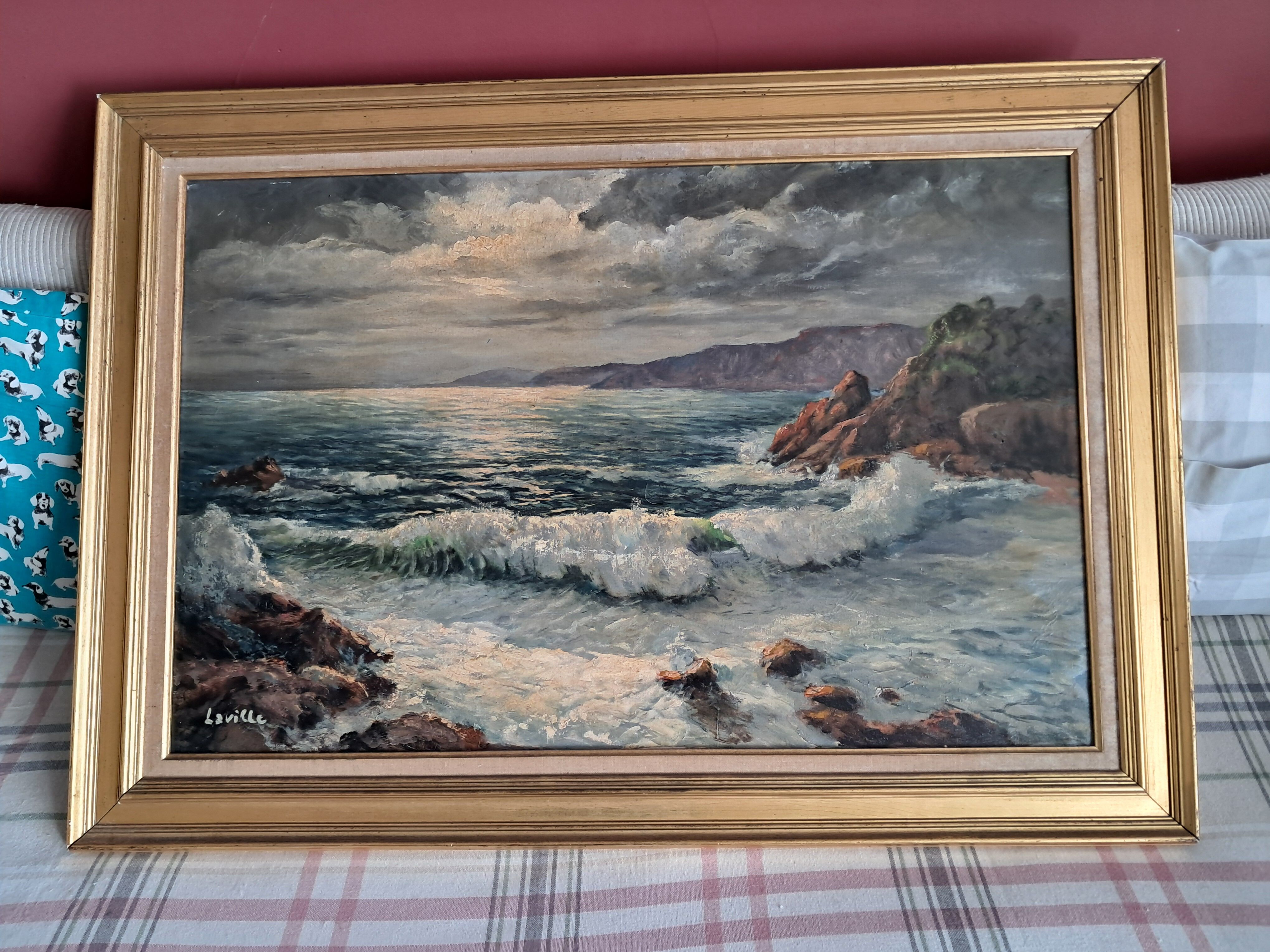 Large old oil painting depicting a seascape.