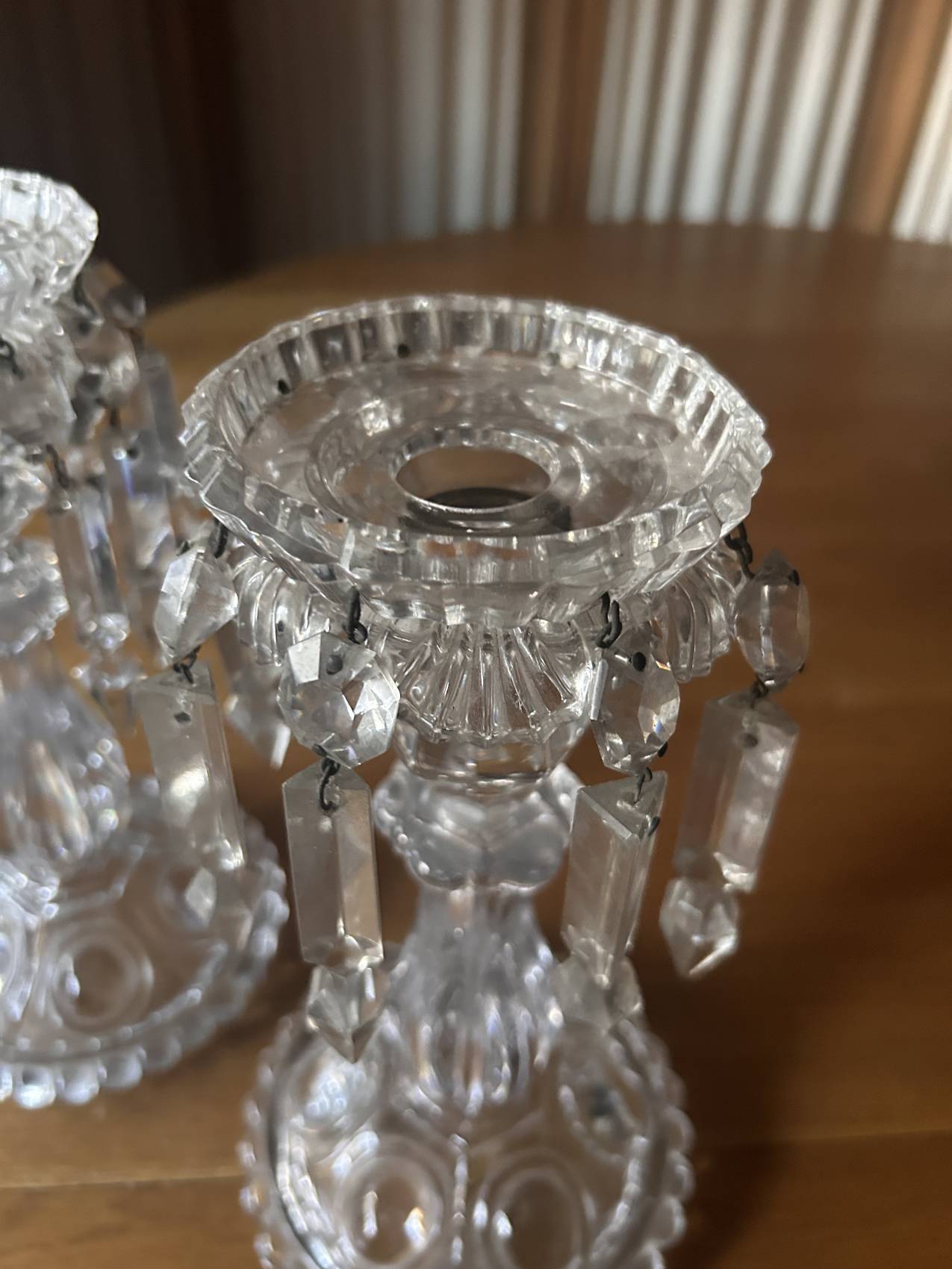 Pair of large Baccarat crystal candlesticks with pendants, a rare choice.