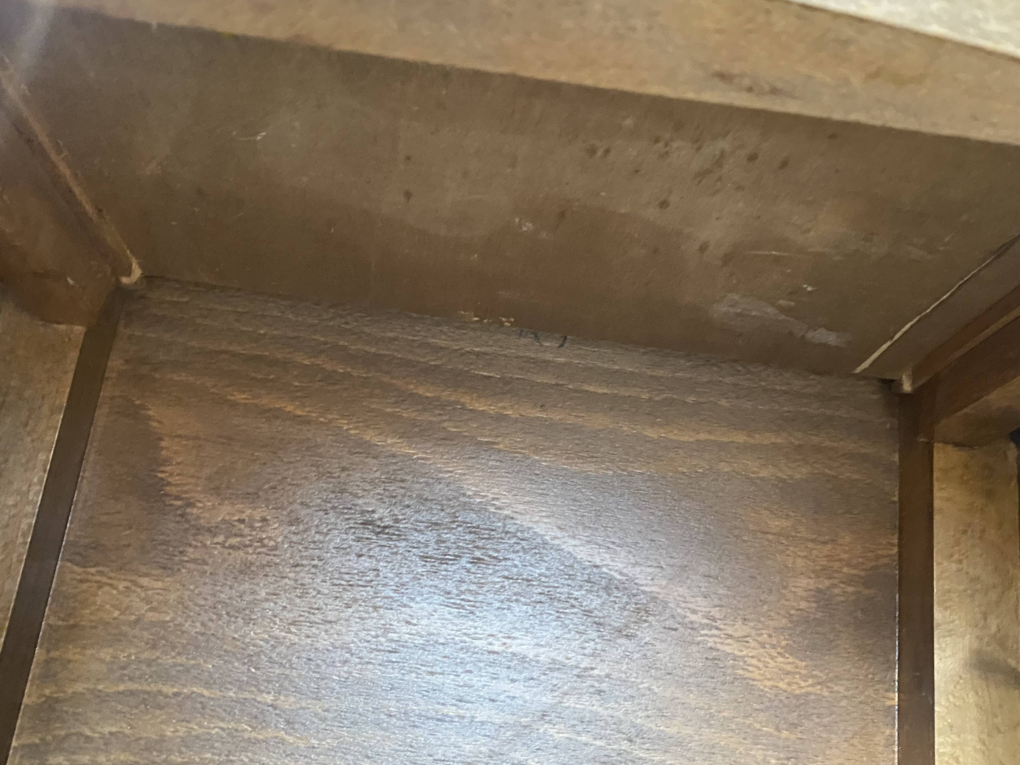 A bedside table with a drawer and a niche in Louis XV style.