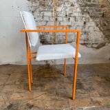 Pair of postmodern orange armchairs and bouclé wool fabric