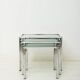 Nest tables in chrome and smoked glass, Italy, 1970s.