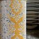 Oval paper bin in woven ochre and grey cotton