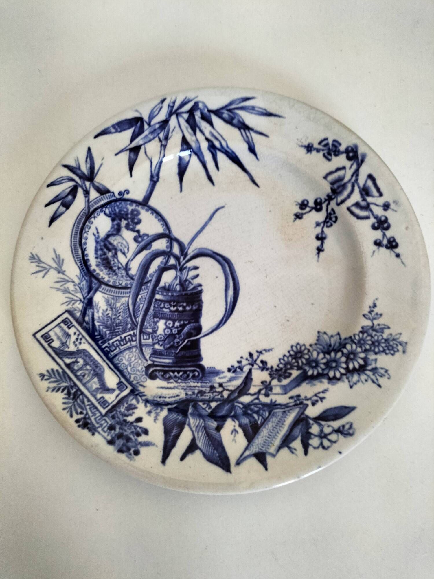 Antique plate with Chinese blue oriental decoration from the late 19th century.