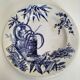 Antique plate with Chinese blue oriental decoration from the late 19th century.