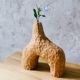 Hand-carved soliflore vase in solid chestnut wood.