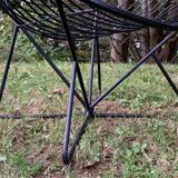 Pair of round chairs in black tubular steel 1960