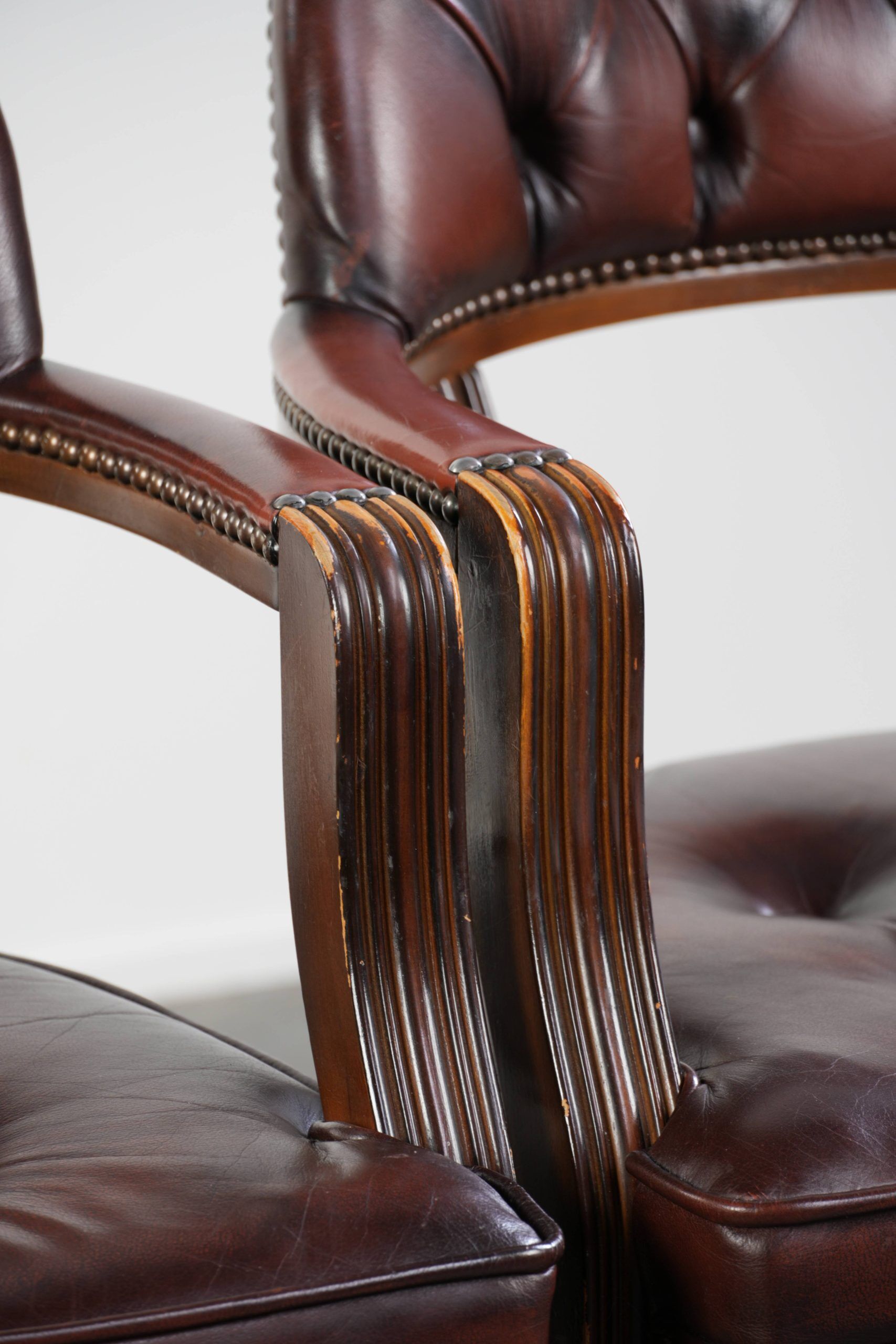 Set of two brown cowhide leather Chesterfield dining chairs