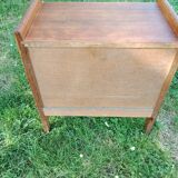 Bedside table with braces