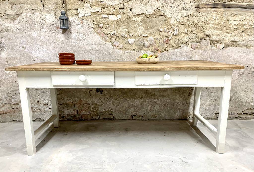 Farm table with off-white legs.