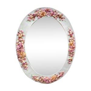 Miroir à encadrement floral en