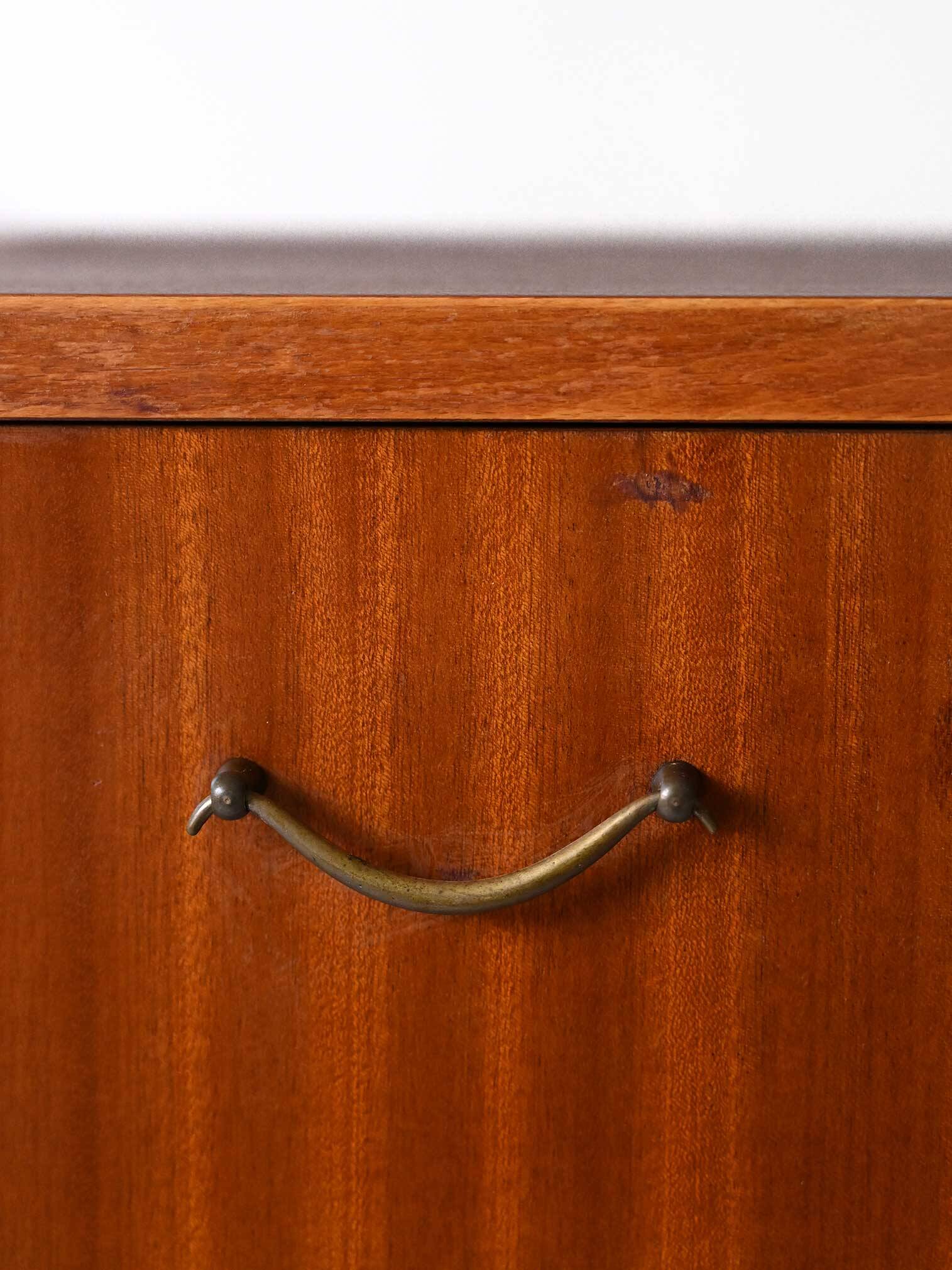 Scandinavian chest of drawers with metal handles