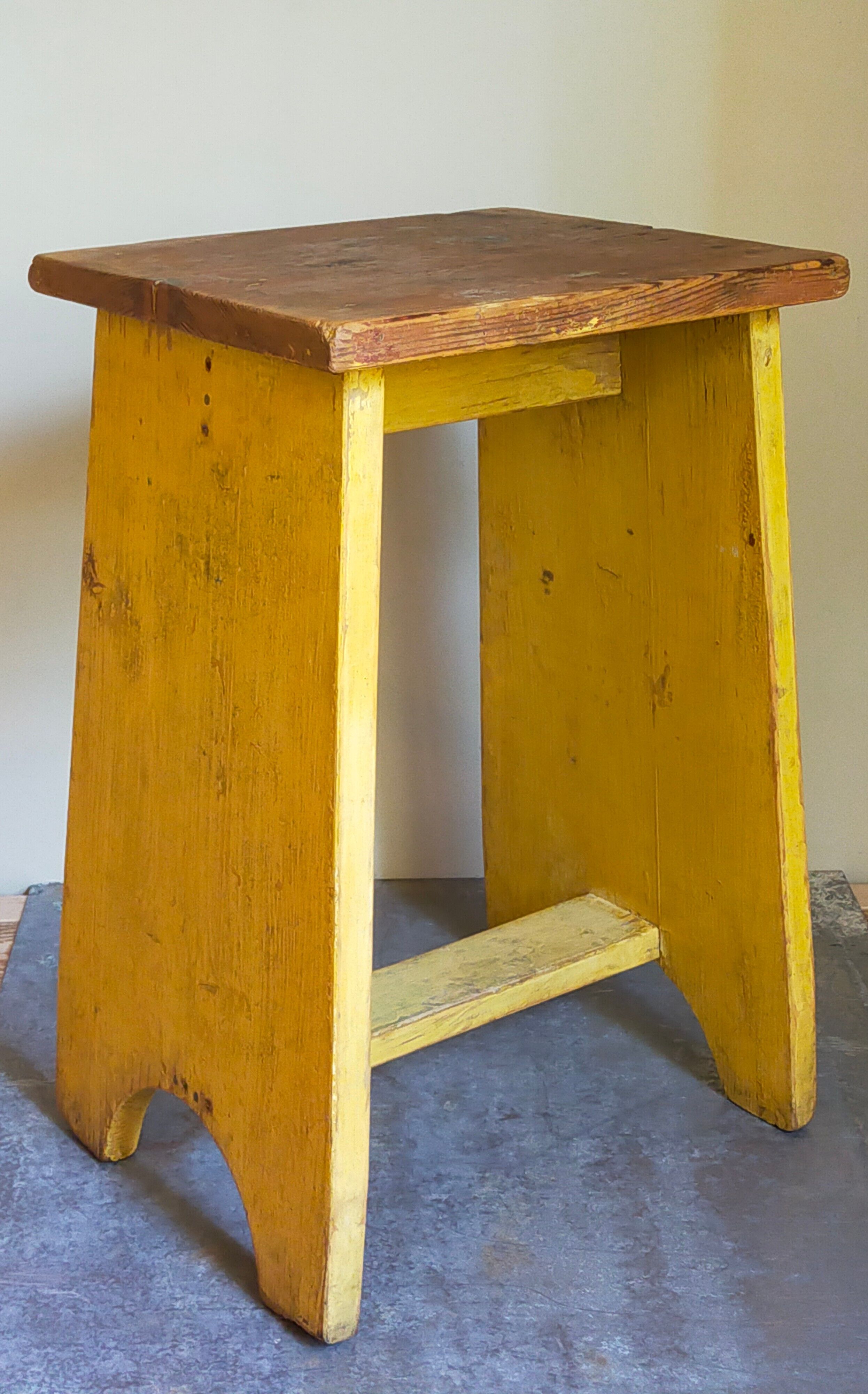 Art-populaire workshop stool in patinated painted wood