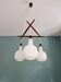 Scandinavian chandelier in teak and white opaline, 1960s