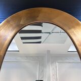 Gold oval mirror