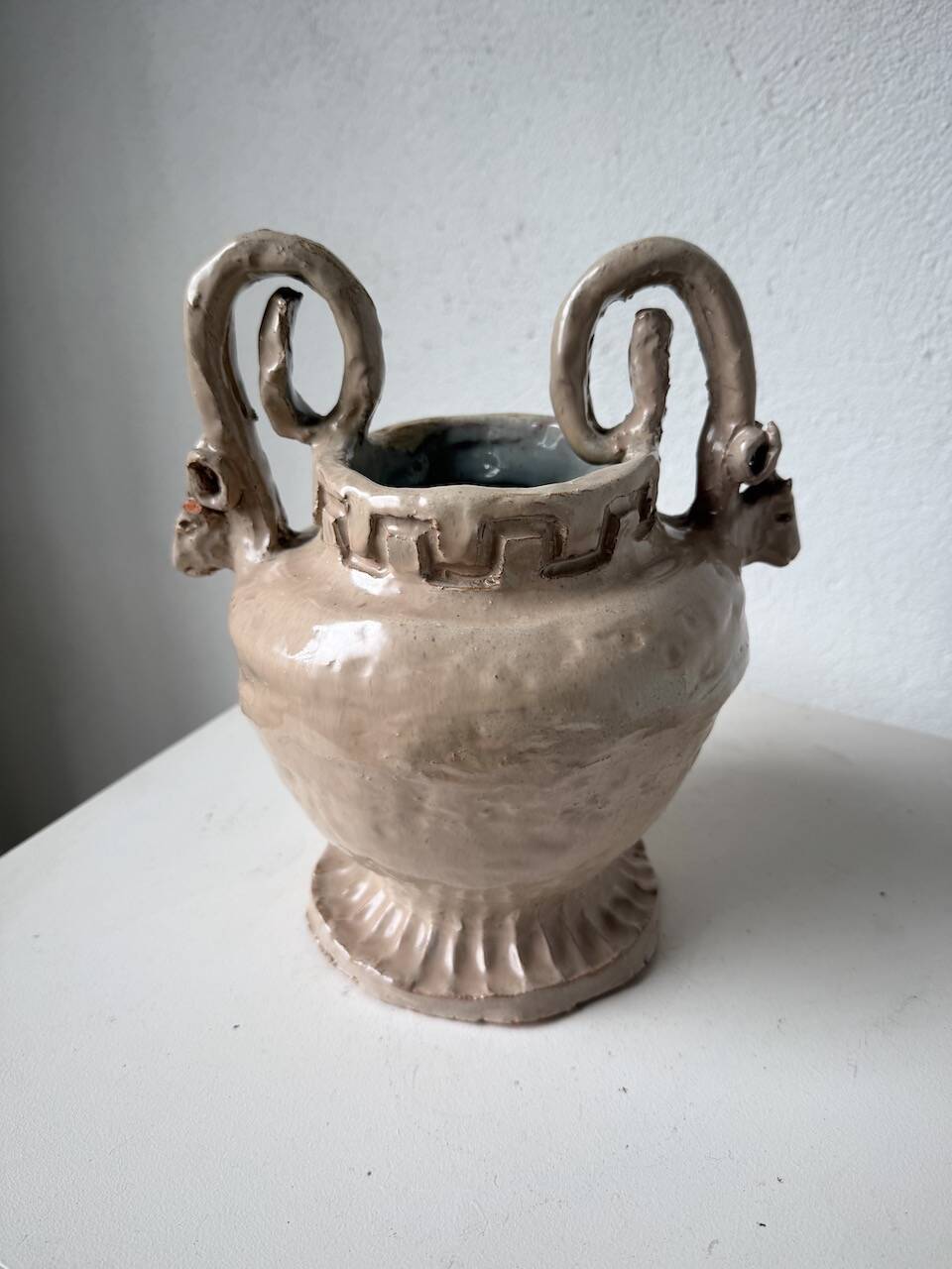 Ceramic bowl with ram heads