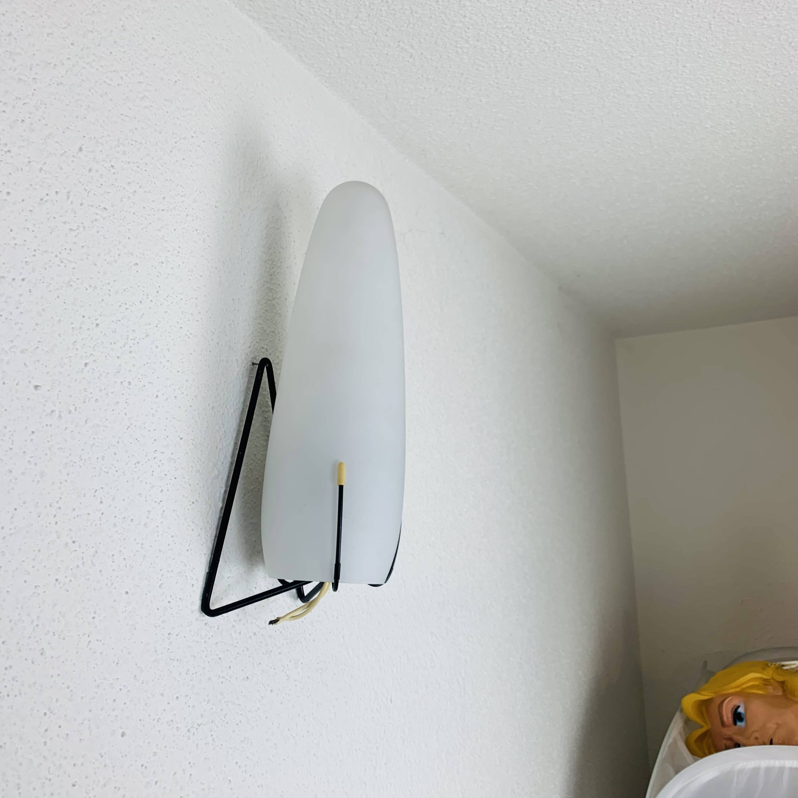 Louis Kalff wall lamp from the 50s, opaline