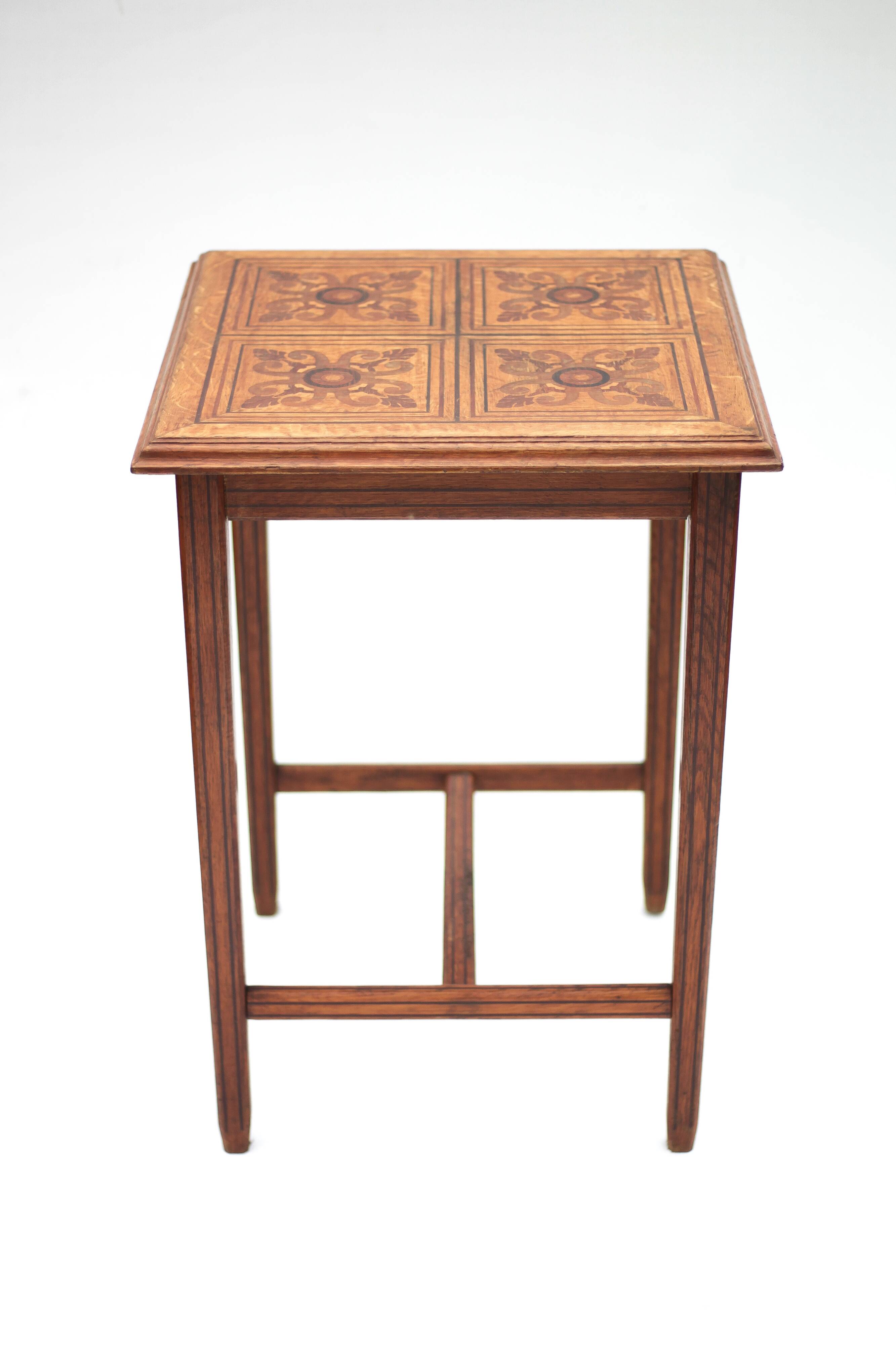 Wood table with marquetry, table with an antique parquet top, antique table.