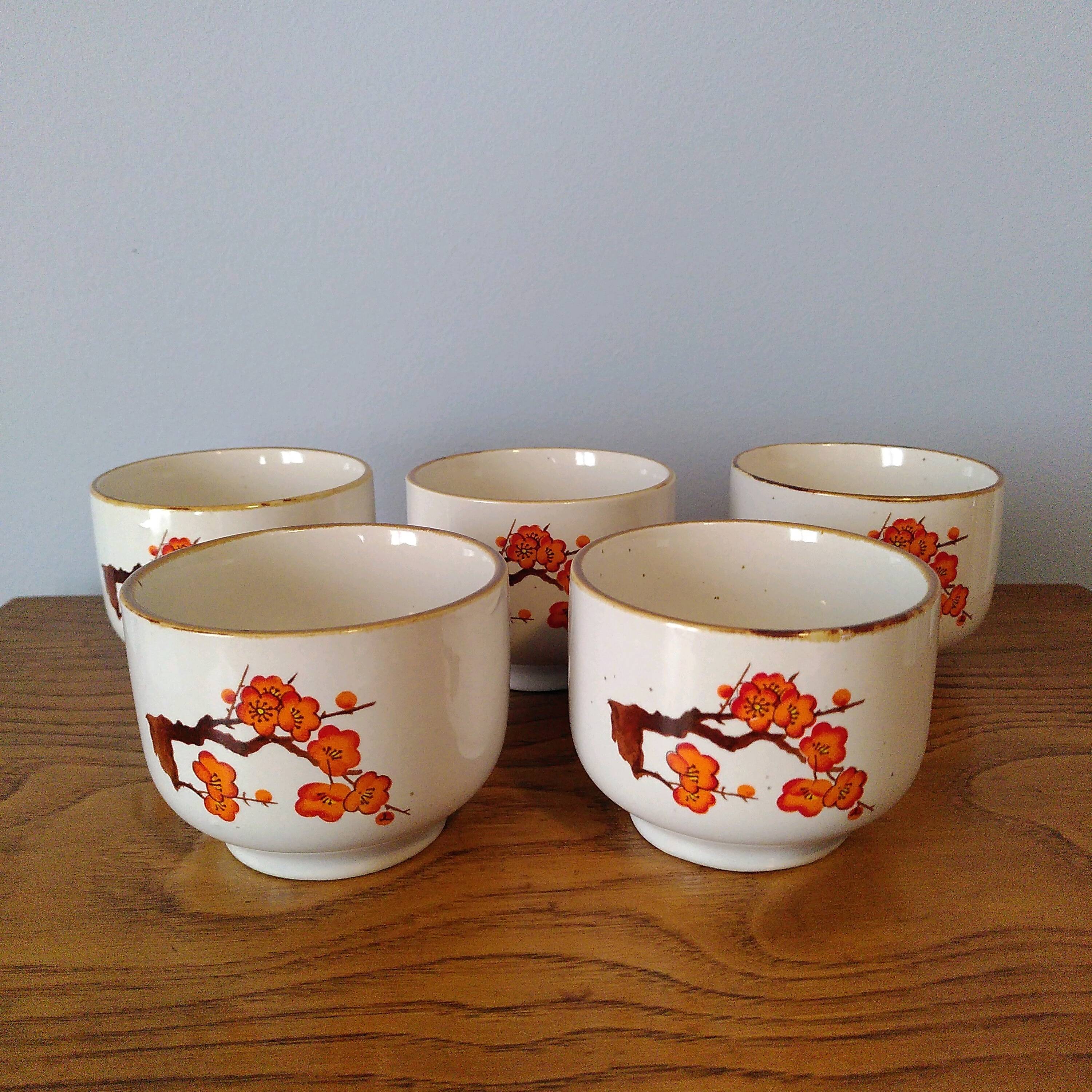 Orange flower tea cups