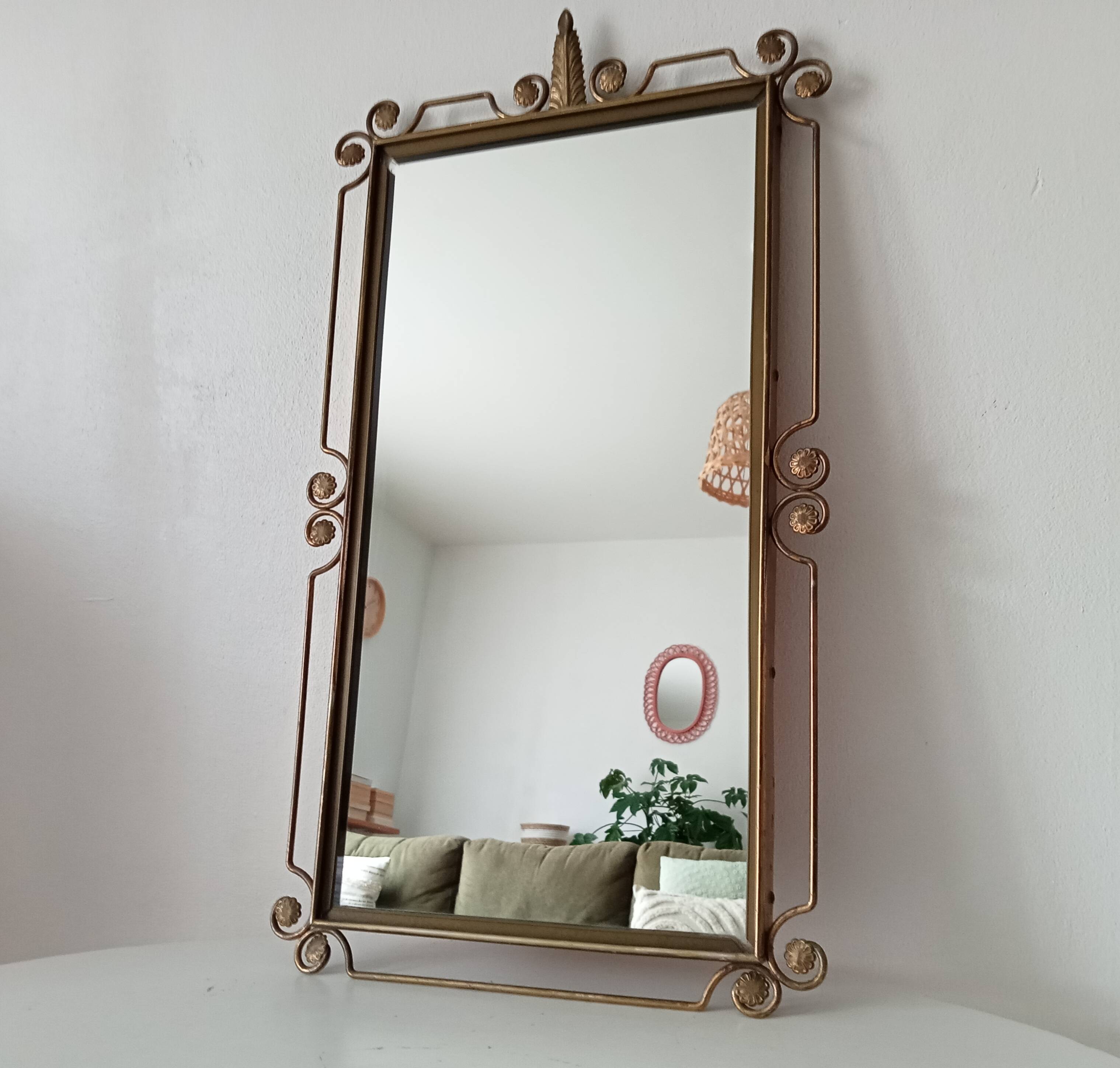 Vintage Hollywood Regency mirror from the 1950s.