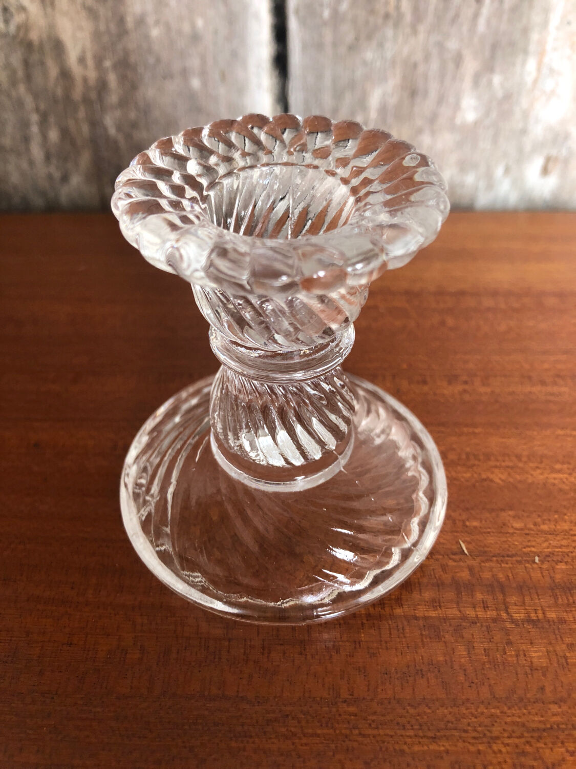 Old pair of vintage round molded glass candle holder