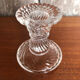 Old pair of vintage round molded glass candle holder