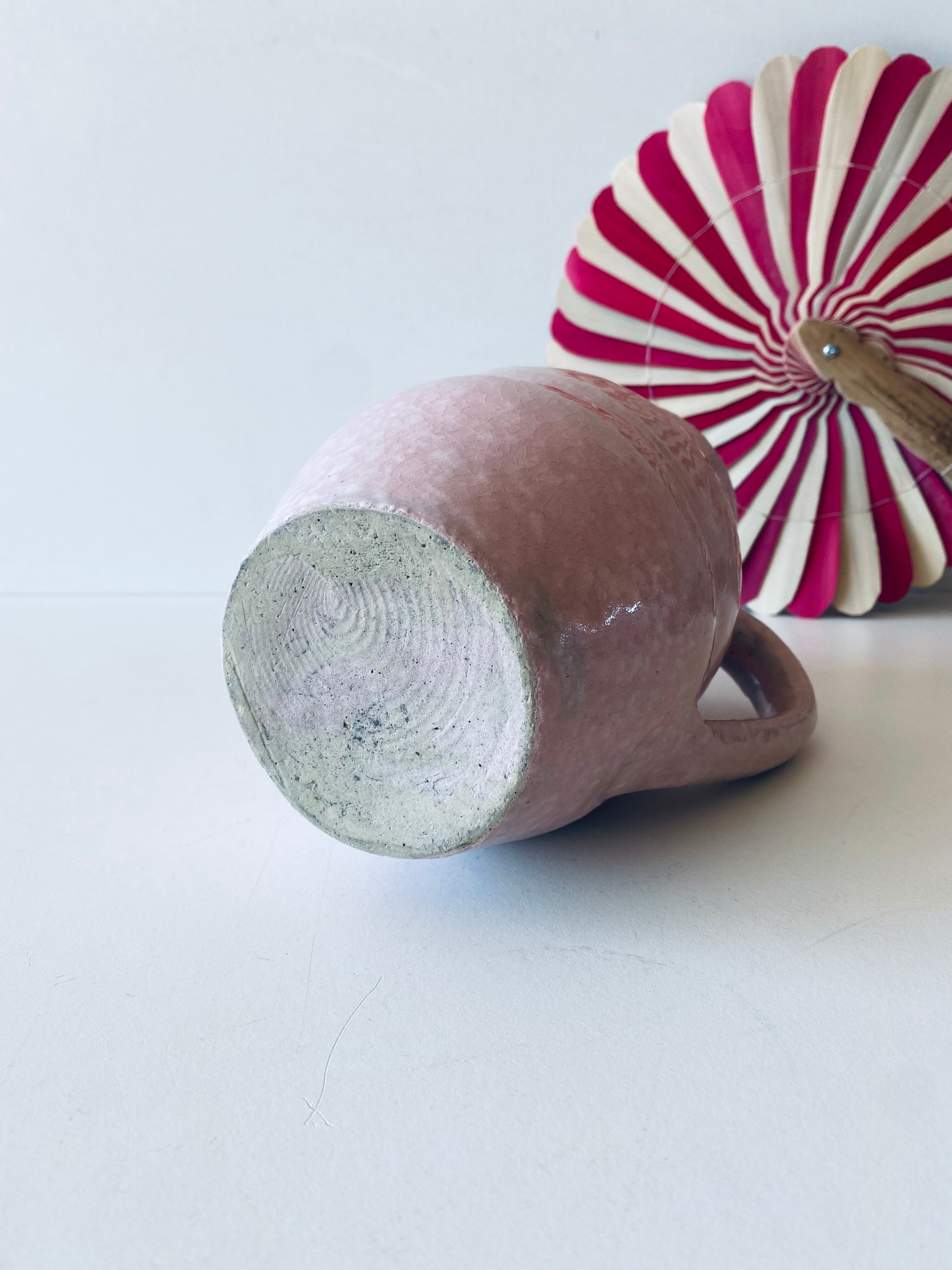 Pitcher in pink glazed ceramic