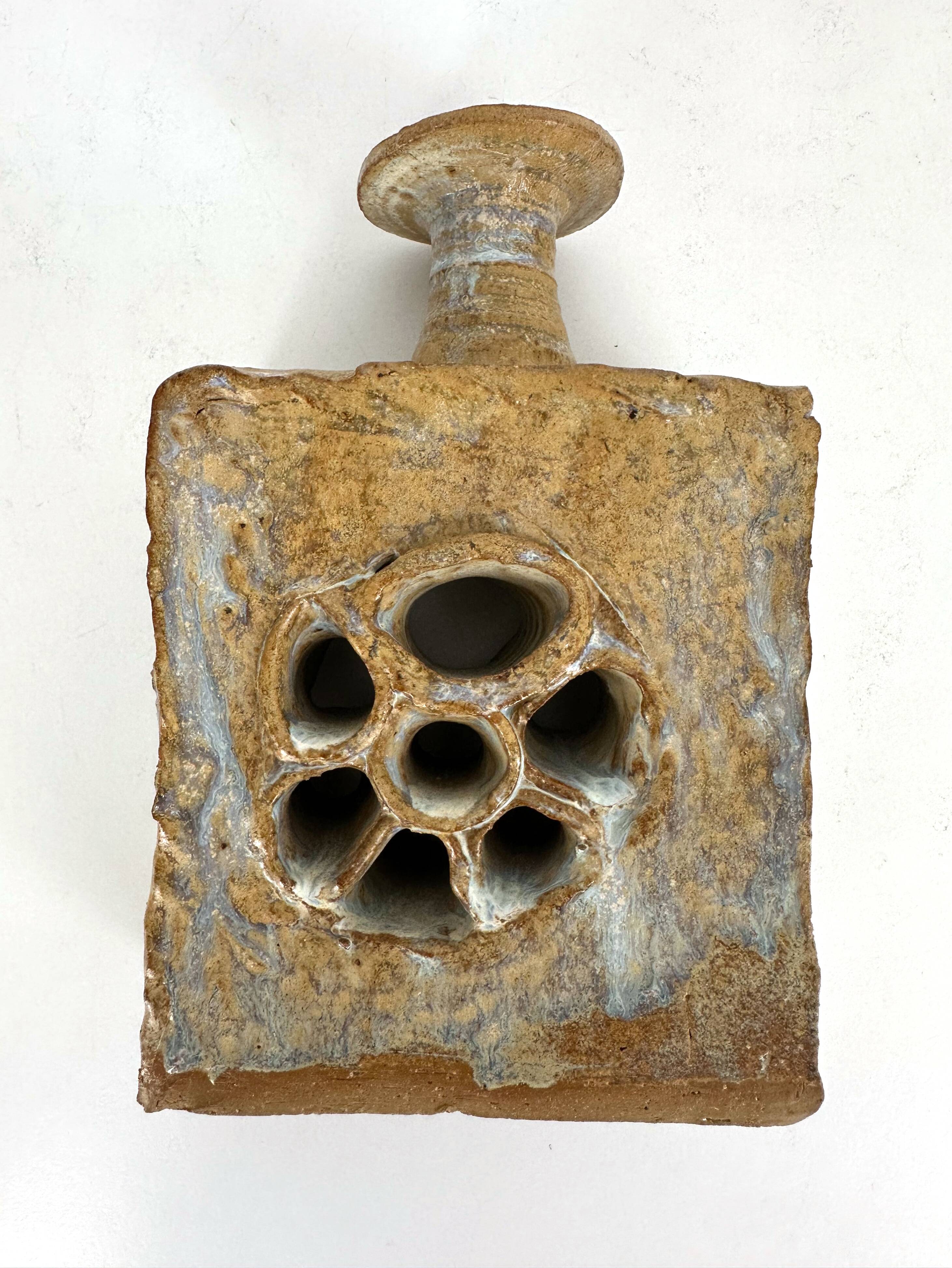 Brutalist stoneware vase with openwork decoration, Denmark, 1970.