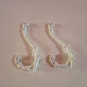 set of 2 vintage white cast iron hooks, small paint chips from the year