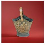 Antique red copper umbrella stand decorated with putti angels.