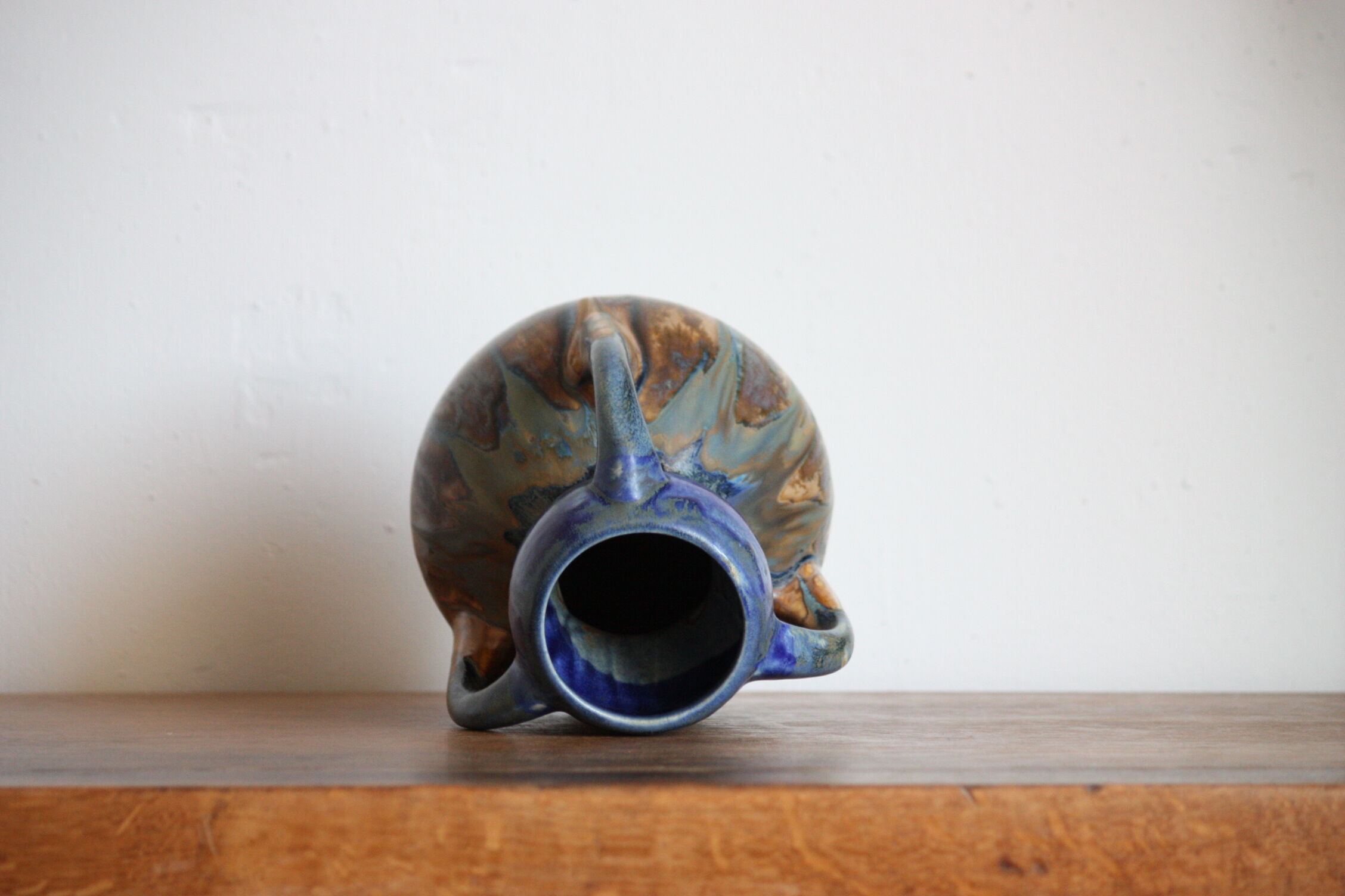 Blue vase in flaming sandstone