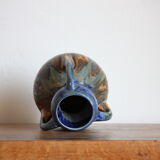 Blue vase in flaming sandstone