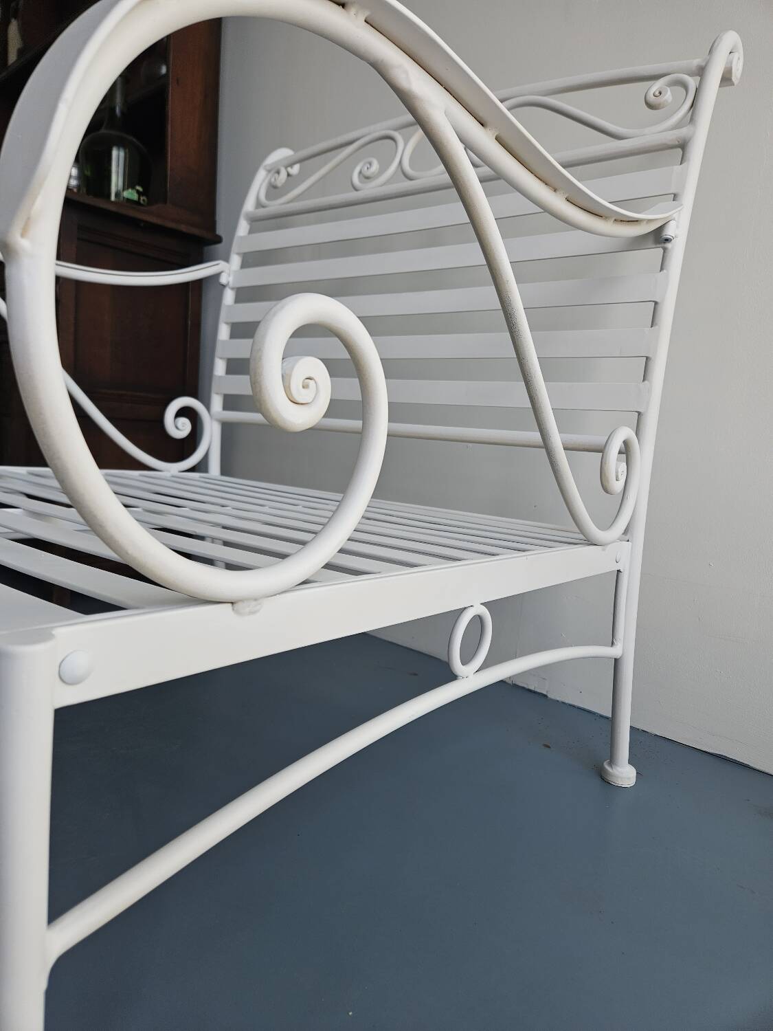 Robust wrought iron armchair